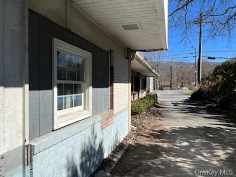 Presented here is a unique opportunity to own this centrally located commercial property in the Village of Ellenville. Property boasts two curb cuts on US Route 209 and an additional curb cut on Warren Street. The curb cuts plus the central location make this property ideally suited for a variety of undertakings. Former occupancy was a fast-food establishment, and the drive-thru potential still exists. The property has two private offices and a large service area. The possibilities are endless. Restaurant, retail,   an auto dealership, even a business incubator. You are only limited by your own imagination.