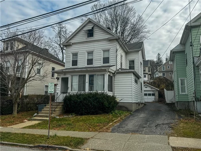 Situated in the heart of Ossining, New York, this 2-family duplex offers a unique blend of modern comfort and renovation potential. The property features two 2-bedroom units, with one having undergone a complete renovation, showcasing contemporary upgrades, including Mitsubishi ductless mini-split units for efficient climate control. The second unit, a spacious upstairs apartment, awaits a creative touch and some tender loving care (TLC). Boasting bright and airy living spaces, this duplex is characterized by its unique layout, including a loft bedroom that adds a touch of character and versatility, complementing the sizable primary bedroom. The driveway can comfortable park approximately 4 cars with an additional space in the garage. This property presents an exciting investment opportunity, blending the appeal of a turnkey unit with the prospect of personalization and value enhancement in a thriving Ossining neighborhood.