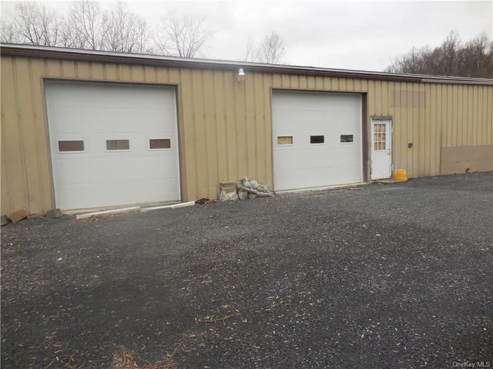 COMMERCIAL FREE STANDING BUILDING ON NC ZONING FOR LEASE ON 9W IN NEW WINDSOR...1700&rsquo; sq. ft. metal building 28&rsquo; X 58&rsquo; on ground floor on concrete slab w/10&rsquo; high 2 garage bay doors & 2 small access doors. Space is divided to 2 bay garage space, an office, storage and wash room. Parking on 3 sides of the building, approximately 10-12 cars. Space, after registered & approved by the town, can be an auto repair shop, any contractor space, storage etc... Easy access location from every major traffic artery of the area, I-87 & I-84 plus close proximity from surrounding towns away from the daily traffic jam. Next to Dunkin Donuts & diagonally across from long established successful Sportsplex gym.