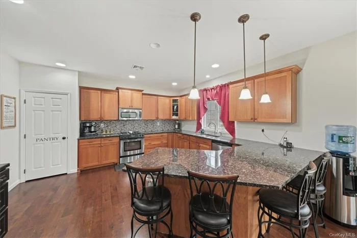 Available! Stunning Colonial in the Cornwall School District. There is nothing to do here except move-in and enjoy this lovely home, just minutes from town while maintaining an element of privacy. The kitchen, which opens to the large family room, boasts 42 inch cabinetry, granite counters, and stainless appliances. Dining can take place in the eat-in kitchen area, or the formal dining room. There are 3 bedrooms here, with TWO additional rooms (one upstairs and one on the main level), either of which could make an excellent home office, craft space, home library, or anything else you can imagine. The master suite has a massive closet and dream bathroom! And there is 2nd floor laundry! The main level has radiant heat, as well as a brand new Bosch heat pump. There is also forced air and Central AC; and solar panels to reduce your overall utility bills. 11 miles to West Point; 8 miles to Stewart Airport/ANG; about 60 miles to NYC.