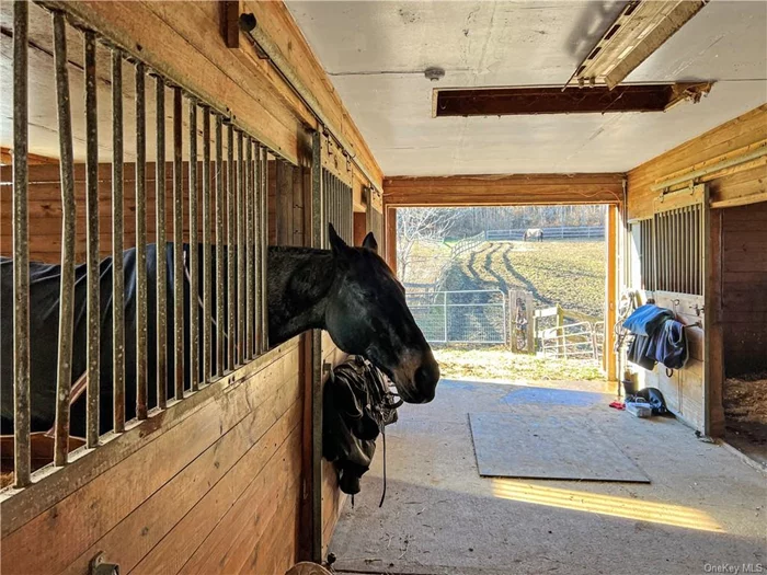 Oriole Mills Farm. Nestled in the rolling hills of the Hudson Valley, ninety-eight acres of prime real estate is split between the townships of Rhinebeck and Redhook and just five miles away from both quaint villages. Whether you are a horse lover or not, this property is an incredible opportunity. For the equestrian, there are many improvements already in place. The indoor arena measures 60&rsquo; x 120&rsquo; and is perfect for year-round riding and training. The outdoor riding ring is adjacent to several paddocks with run-in sheds and captures the views of the valley, making it a great place to practice and hone your skills. There is an eight-stall barn equipped with everything you need to keep your horses healthy and happy and an office/guest suite with an additional four stalls in an adjacent building. Enjoy miles of maintained carriage trails on the property and direct access to the LKTA trail system, allowing for beautiful, long rides throughout the countryside. There is also a caretaker/guest cottage, pool, and a large old barn with hand-hewn beams ready for restoring or repurposing. For the non-equestrian, the property could be subdivided and the improvements sold off, convert the buildings for other uses, or lease that portion of the property and enjoy seeing the horses plus the added income. While there is plenty of room to choose the perfect house site, we have identified three gorgeous possibilities and labeled them in the included photos. All three command stunning distant views, large level areas for backyards with pools or other amenities, and tons of privacy. Being only 90 miles to NYC, in such a sought-after location, with so many development possibilities, this offering is truly a once-in-a-lifetime opportunity.