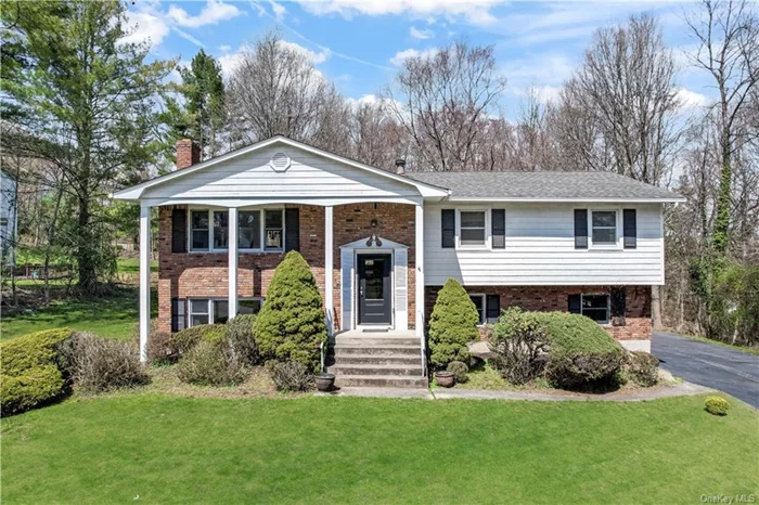 Come see this wonderful 4 bedroom, 2.5 bath bilevel on a highly desirable cul-de-sac in West Nyack NY! Just minutes from exit 7 on Palisades Parkway makes this an easy commute to NYC, NJ, and Westchester. This 2216 square foot home sits on a very private, 1-acre lot in the award-winning Clarkstown Schools! Lots of living space with a living room, dining room, kitchen, and 4 large bedrooms. Stunning fireplace surrounded by stone wall. Hardwood floors on most of the upper level. Tons of natural light from oversized windows. There is a 2-level deck from the kitchen for grilling and relaxing in the sun. 2-car garage. Central AC and 2-zone baseboard heating.