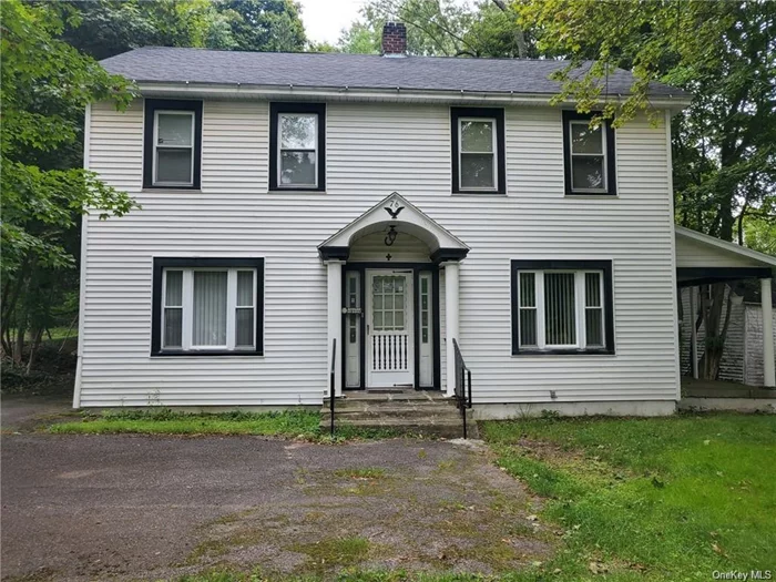 This is a very well known property in town, rooms are spacious 3 bdrm, 1.5 bth, Dining Room, Living Room, Double Pane Windows, on the 1/2 acre it is zoned Commercial or Residential.