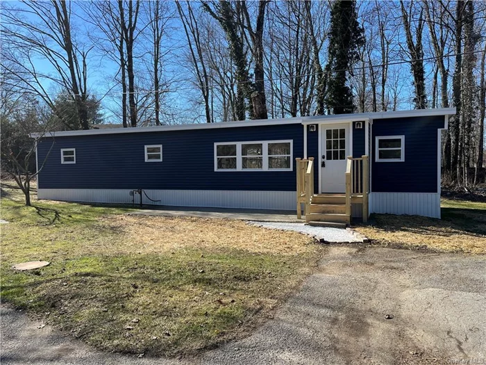 Financing is available for this beautiful mobile home located in an exclusive four unit mobile home park in the town of Lagrange and Arlington School district. The HOA is $725 per month and you do not own the land. HOA iincludes taxes, water, sewer, snow removal and management. You will not be disappointed when you enter this recently updated open floor plan home offering a bright eat in kitchen with gorgeous wood cabinets that opens seemlessly into a large living room dining room area, spacious laundry room with front load washer and dryer, full bath with walk in glass shower and a cozy one bedroom. Some of the many updates include freshly painted, kittchen, bath, roof, siding, windows, flooring, plumbing, pocket doors, recessed lighting, and decks. Close to route 55 and Taconic State Parkway, colleges, metro-north Poughkeepsie train station, Vassar Brothers Medical Center, Mid-Hudson Regional Hospital, IBM, CIA, Shopping, 5-Star restaurants, water front and major commuter highways . THIS WILL NOT LAST .