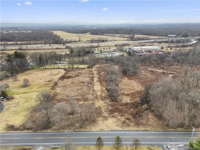 Prime 4.1-acre parcel with nearly 300 ft. frontage on rte. 211E! Explore the potential of this well-located property for your next venture.