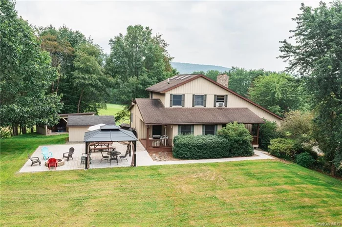 Amazing Dog Kennel Business opportunity included with this Country-Modern home boasts an array of amenities, featuring two bedrooms, a wrap-around sunroom, an office, and more. The centerpiece is a magnificent fieldstone-faced chimney equipped with multiple-level wood stoves, complemented by an exercise room and well-maintained utility areas. Inside, you&rsquo;ll find old-fashioned cast iron radiators, a spacious living room with a vaulted ceiling, and a generously sized kitchen boasting Corian countertops and modern appliances. The laundry room is equipped with a washer and dryer purchased new in 2020. Outside, a sprawling deck and stone patio/barbecue area offer picturesque settings amidst attractive landscaping. Additionally, this property includes a thriving dog kennel and boarding business with a stellar reputation and loyal clientele. Complete with separate kennel buildings, fenced play areas, and ample leash-walking space, the business is poised for growth with potential expansion into grooming, training, and transportation services. For animal enthusiasts, there&rsquo;s a barn with hay loft, paddocks, a riding ring, and a mountain stream. Access to nearby hiking trails adds to the allure, while multiple garages and a workshop provide added convenience. With its enticing blend of residential comfort and business opportunity, this property offers a chance to become your boss in a picturesque setting. Priced at $699, 000, it presents a unique investment opportunity not to be missed.