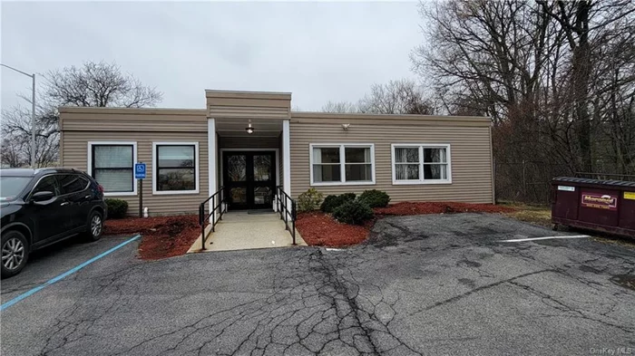 Up to 6 Medical office and exam rooms with private parking lot, $700 and up for suite to include utilities. Space would be shared with current practice.