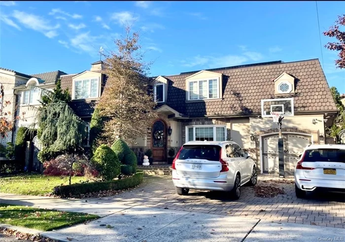 &rsquo;BROKERS URGENT MUST READ AGENTS REMARKS HOWARD BEACHexquisite 5 BDRM, 2 Kitchens, 3 Fireplaces, 4 Bath, Huge detached w/ Tudor style w/colonial layout, have best of both worlds, 3060 sqft of luxury on 60x100 resort lot.#1st floor Entry, Din rm 15-20 Crown moldings & wains, living rm w/a fireplace w/ doors to your 0asis yard. Custom Kitchen granite counters, S.S. app.& island + fireplace door to yard, radiant heat.Filter (Aquasona) purity both drink & shower water.5 Bdrms , 1st fl BDRM or Den , full bath, 2nd floor Primary Bdrm Suite Romantic & Zen retreat, fireplace spa bath. Huge Custom walk-in closets w/an island.Laundry Rm w/ granite counters, & Doggy Spa, 2 washer, dryer. 3rd BDRM, 4th BDRM painted Star Wars room May the Force Be with You. Fin.Basement w/door yard Family Rm movie & game nights. kitchen & island, Butler&rsquo;s pantry & bar area. exercise area can fit a Gym, poker nights & arcade games & Pool Full bath, In-ground Pool 32X16 heated&saltwater pool.Solar, Much more