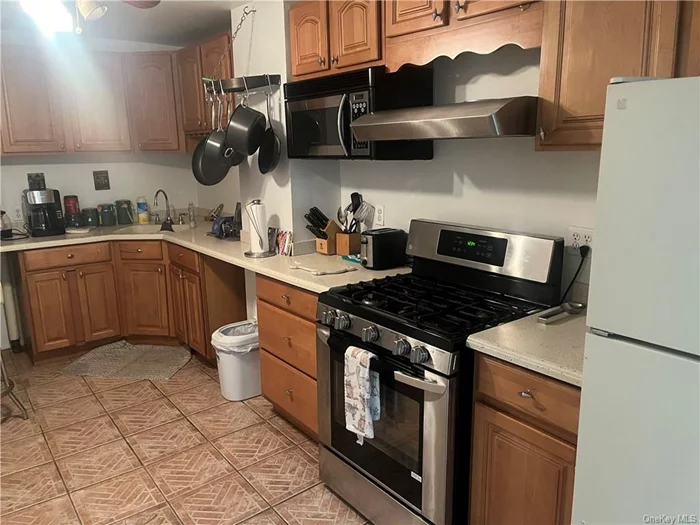 Pre-War Rental, Fully Furnished 1 Bedroom Apartment in East Harlem, Features Private Back Yard Accessible to Bedroom, Huge Kitchen, Bedroom, and Bathroom. Building is set back from sidewalk and is enclosed with Iron Gate. No pets. Electrical Bill to be shared with 2nd Floor Tenant. No smoking allowed in apartment. Prospective Tenant is subject to background & Credit checks. Close to Public Transportation