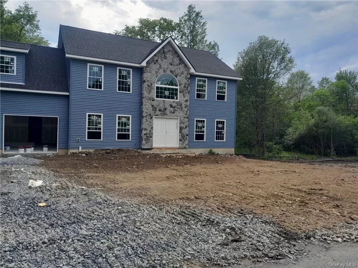 New Construction!!! In Goshen - close to everything - still time to choose colors- 9 rooms finished! 2739 Square feet finished- Garage and Mech room 579 SF unfinished -Central Air- Cathedral Ceiling in Master Bedroom - Fireplace in family room - many more features!