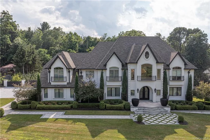 Absolutely stunning estate on private one acre, 30 miles to NYC. Features 6, 00sqft, 6 bedrooms and 5.1 luxury baths. All done tastefully in 2018. This home feels more like a country club with both indoor and outdoor amenities that will leave you breathless. A one-of-a-kind oasis offers an expansive, lush, property professionally landscaped with specimen plantings, custom lighting design, mature trees and incredible in ground pool. Dramatic entry foyer with double doors and high-end porcelain tile floors.radian heat in kit area & Master bath. Luxury center island kitchen features high-end porcelain tiles, crown moldings, stainless steel appliances, dining area and opens to private backyard. The family room with fireplace has a wall of glass overlooking the amazing property. Master bedroom has a luxury master bath with soaking tub, rain shower and tray ceilings. Hardwood floors throughout, gym area, and 3 car garage. Ten minutes to Piermont and Nyack with five star restaurants, boardwalk along the Hudson River, art galleries and Tallman State Park. Photos speak for themselves.