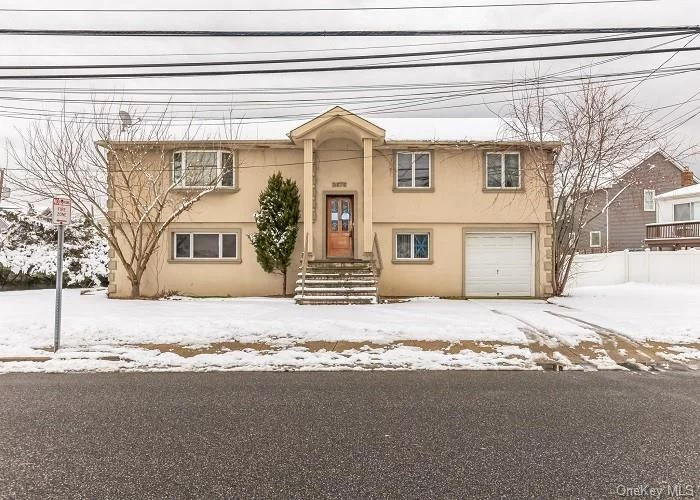 Opportunity knocks on the canal in Belmore, NY. This property shows it was built in 1984 and has approx. 2, 134 square feet. Sits on a good size lot of approx. 6, 477 sq. ft. In this location this one will not last long at this price. If you blink it will be sold. Buyers check with City, County, Zoning, Tax, and other records to their satisfaction. AS-IS REO property. Buyers to inspect prior to bidding.