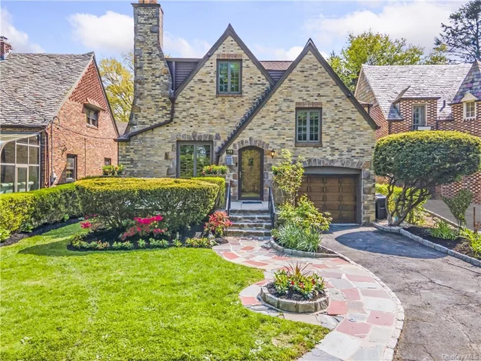 Live your own fairytale! This lovely custom English Tudor located in Pelham Manor is close to school, shopping, dining and offers a painless commute to NYC. Within, you&rsquo;ll find a splendid entryway, curved archways and doorways, natural light, stylish fixtures, neutral decor, vaulted ceilings, and a wood burning fireplace in the living room. The gourmet modern kitchen is bright with natural light, includes premium appliances (Wolf, Subzero) and provides easy access to entertain in the backyard. More than simply restful, the feature-rich oversized primary bedroom includes a custom walk-in closet, and a private marble bath with a walk-in shower. The other four bedrooms, distributed on multi-levels for privacy, are unique and rich with ample closet space. A finished lower level serves as a rec room, multi-purpose room, and home theater. Off the attached one-car garage find a private office with a view and access to the gorgeous landscaped backyard. The quest for Camelot ends here.