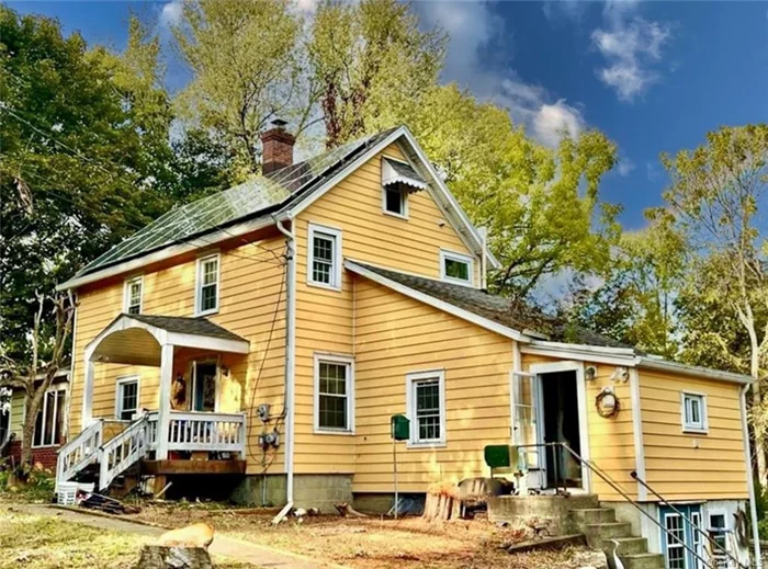 This 1930s 2-story home has 3 bedrooms, hardwood floors, and it sits on .99 acres of leveled yard with cleared field and mature trees. Newer roof and siding. Updated windows. Large wrap around deck. This home is ideal for anyone looking for a unique and historic home in a great location or usable land. Solar system offsets cost of electricity. Home comes with convertible sauna. Sellers will remove if buyers do not want it. NOTE: Cosmetic damage due to upstairs bathroom leak needs 4x8&rsquo; Sheetrock panel for Repair. Needs new kitchen, Needs update 1st floor half bath.