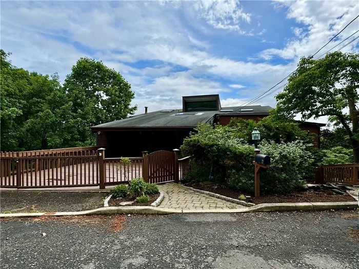 Welcome to a unique opportunity to own prime real estate in the heart of South Nyack. This stunning multi-level home boasts breathtaking full-wall window views of the majestic Hudson River and the iconic Tappan Zee Bridge. Perfectly situated, this property offers unparalleled proximity to New York City, Westchester, and the vibrant village of Nyack, known for its rich theater and arts scene.  Nestled on a quiet, private road, this home invites you to bring your interior decorating and renovating ideas to life. With an open concept design, the residence features an inviting foyer, floor-to-ceiling windows, and hardwood floors. The spacious layout includes a loft, a primary bedroom en suite with a walk-in closet, multi-level bedrooms and living spaces, a laundry room, and outdoor decks perfect for entertaining. Additionally, a separate lower-level entrance adds to the home&rsquo;s versatility.  Don&rsquo;t miss out on transforming this once-in-a-lifetime property into the envy of the neighborhood. Embrace the endless possibilities and make this your future dream home today!
