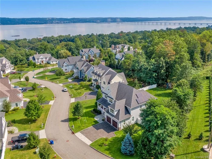 Check out this amazing 4 Bed / 3 Bath Colonial in Upper Nyack, NY! With striking views of the Hudson River from every level of the house and featuring 3, 269 sq.ft. of living space on the largest lot in Riverton at .61 acres, this home has it all - double barn doors, wood beams, a gas fireplace, fully owned solar panels and a baker&rsquo;s kitchen. 14 Riverton seamlessly merges modern convenience with Restoration Hardware elegance. Don&rsquo;t miss this rare gem of newer construction. Enjoy top-rated schools, a vibrant culinary scene, and endless outdoor adventures! Security cameras on site.