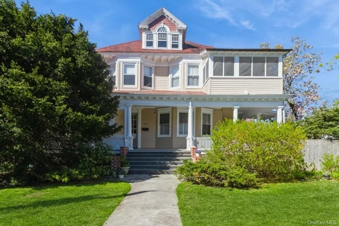 Welcome to this Grand Colonial with wraparound porch. Conveniently located in the Village of Mamaroneck in the Rye Neck school district. Walk to school, train, vibrant downtown, and Harbor Island Park, which makes this location ideal. This home exudes timeless elegance and historical significance. Stepping inside, you are greeted by a foyer with high ceilings, hardwood floors, and a gracious staircase leading to the upper floor. The first floor boasts spacious rooms, original molding, and large windows filling the home with natural light. The formal living room and dining room showcases the homes timeless elegance with pocket doors, bay windows and fireplace crafted with original wood carvings. The sun-drenched kitchen flows onto the deck is perfect for morning coffee or alfresco dining overlooking an oversized backyard with mature landscaping and towering trees. The 3-car detached garage allows for ample parking and storage. Upstairs, the primary bedroom leads to a private veranda for relaxing on warm summer night. 4 spacious and bright bedrooms and one and a half bathrooms complete the second floor . This home has many architectural details that make this home unique. There is a possible building lot on this property with variances and village approval.