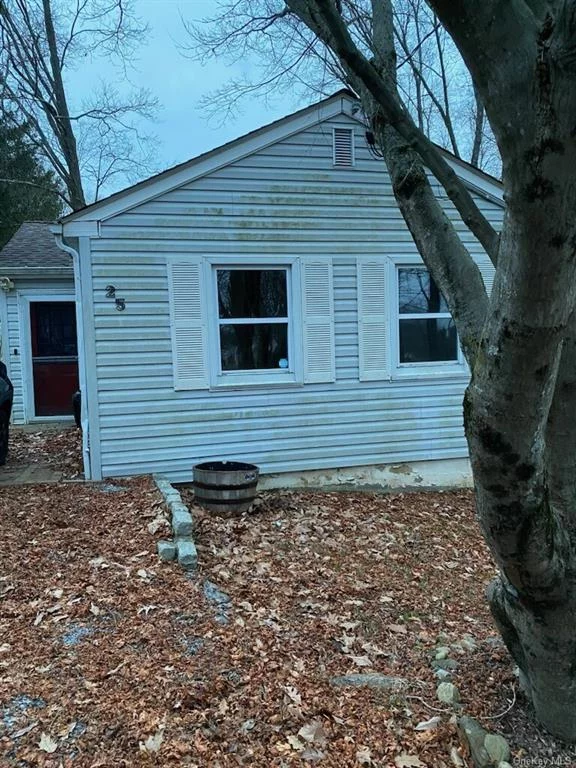 Cozy home in Lake Carmel community not far from the lake. Needs some repairs but still able to live comfortably. Home offers good-sized bedrooms, full bath and dining area with sliders to deck. Hardwood floors thoughout, and Pellet stove. Schedule your appointment today.
