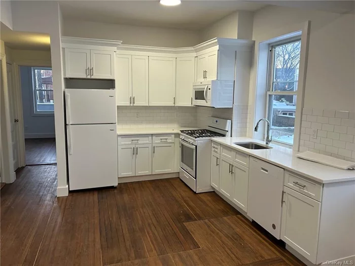 Move right in to this completely renovated, spacious three bedroom, one bath unit in a private home in the Bronx Manor area on the border of Pelham Manor. This unit comes with its own individual laundry. The unit consists of a state of the art heating & central air system. There is ample closet space throughout. There is plenty of street parking, and access to rear yard. New kitchen with brand new appliances, up and down washer and dryer in the unit. Floors are redone and all rooms are freshly painted. The full bath is recently renovated. Close to bus, train and shops. Tenant to pay all utilities. Small pets will be considered.