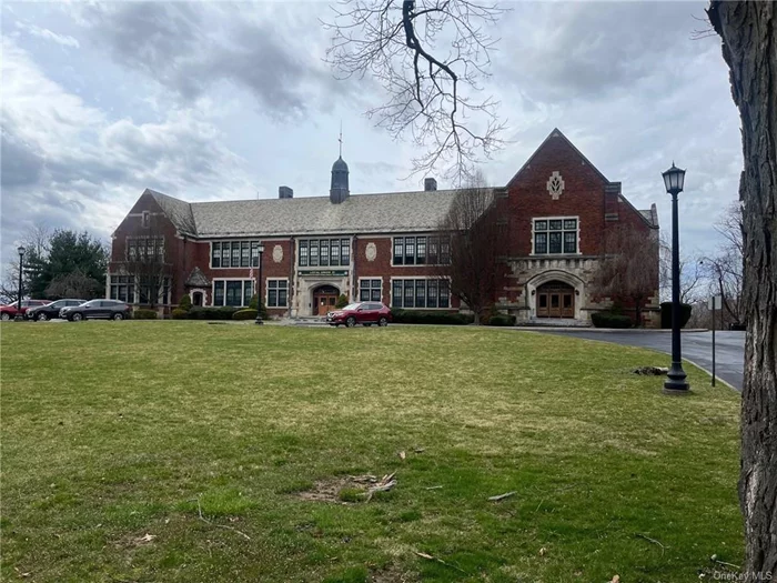 Beautiful former school building now owner occupied. Two offices with own bathroom, plenty of parking, utilities included. Easy access to highways and metro north.