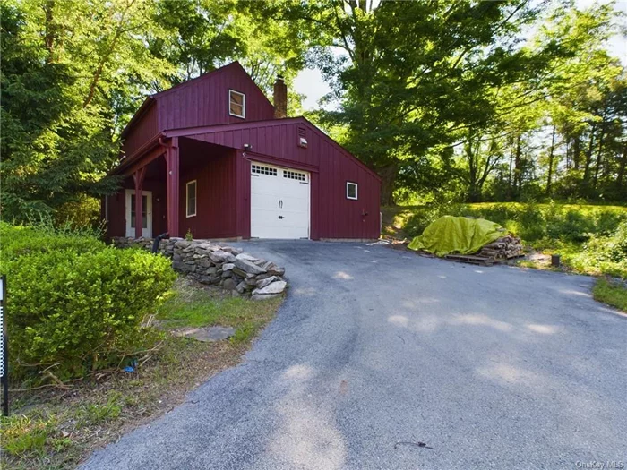 Seeking a get-a-way ,  Hand crafted wooden beams, wide plank flooring, marvelous stone work, a two story entry w/ gallery, newer baths, jetted tub, + a cooks kitchen. Warm + welcoming. Charming screened porch, . Located on 2.6 acres, surrounded by perennials, organic garden space, a sprawling meadow, + seasonal glimpses of the ridge from the property, pole barn(Holds 4 Cars) Manhattan 1hr 20 min, Route 17 E/W just 6 minutes, train 10, services, healthcare, shopping, a+ restaurants at similar distances, State parks, wineries, waterways, and golf all within easy reach. Plenty of room in this 3 level creation for every day living or entertaining family and friends. More pictures too follow soon