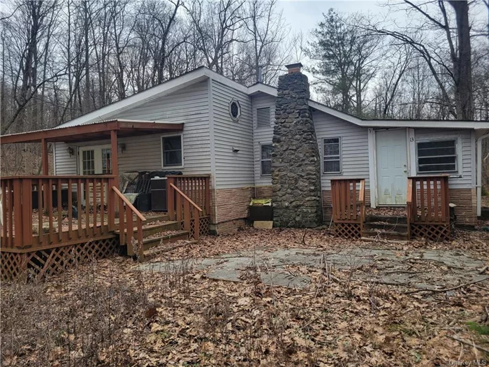 Year round living in this secluded two bedroom home. If your looking for off the beaten path, this is your place. Level lot with two sheds and carport. 1/2 acres. Selling AS-IS with all belongings. Seller looking for Cash offers.