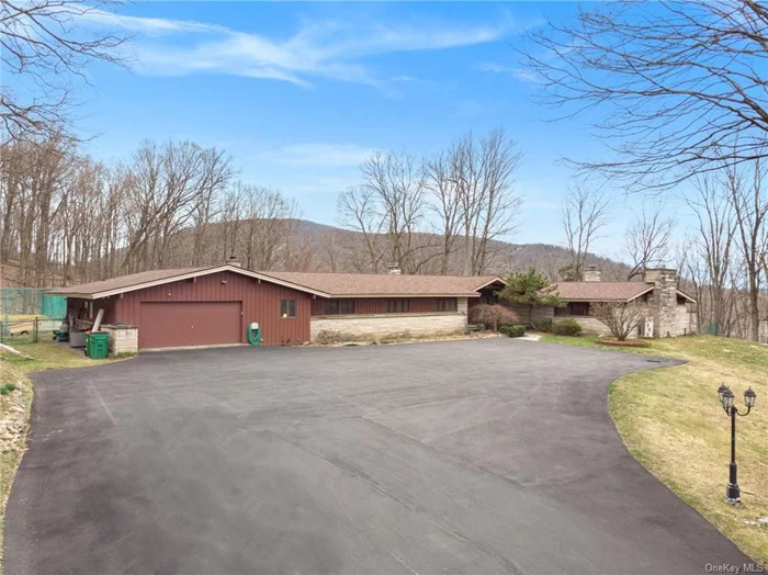 This impressive ranch home sits atop a picturesque view of Fishkill! Boasting a 3700 sq ft of living space with 4 bedrooms, 3 full bathrooms, 2 half baths and sitting on 3.4-acres of land. Follow the freshly laid blacktop driveway, guiding you to a driveway capable of accommodating over 10 cars, along with an oversized attached garage. Enjoy your private backyard with an in-ground pool, fenced-in tennis court, built-in firestone fireplace, and wooded deck leading to the sun house, sauna room, and wet bar inside. With property taxes at $13, 671 and a new roof, your peace of mind is assured. The location is unbeatable, conveniently situated near bus routes, Beacon Train Station, Dutchess Community College, parks, restaurants, shopping, medical facilities, and right off Taconic State Parkway. Don&rsquo;t miss this chance to view this remarkable enormous ranch-style home!