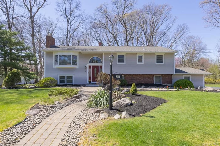 Better hurry to see this beautifully updated, bright and extremely spacious (2, 748 sf) , 4 (poss 5) bedroom, 3 full bath - possible mother/daughter set on an incredible level 0.48 acres of private professionally landscaped property with a large private level backyard in a sought after Nanuet neighborhood! Perfect for a large or extended family or a spacious home with a home office! You&rsquo;re going to love the open floor plan featuring a beautifully updated kitchen w granite counters, stainless steel appliances, recessed lighting and a door leading to a covered deck with a natural gas BBQ - perfect for relaxing or entertaining. The kitchen also opens to a large dining area which opens to the living room. There&rsquo;s an impressive unusually large primary bedroom suite with a walk in closet and a gorgeous, updated large private bathroom with a double sink vanity, quartz countertops, and an oversized multi jet shower. Two more bedrooms (one is currently being used as an office) and another updated full hallway bath completes the upper level. There are oak floors thorughout the upper level except the kitchen, and the baths are nicely tiled. The walkout lower level has a private entrance, a warm family room with a woodburing fireplace, a large eat in summer kitchenette with sliders to a pretty paver patio, a nice sized bedroom with a large closet and a renovated bath with a jetted tub/shower. Simply walk through the laundry/storage room (which can be finished to a 5th bedroom/den/office) to the oversized 2 car garage with lots of extra room for storage. Taxes would be $18, 873, 08 with the basic star rebate of $1, 118.46. Ideally located in the top rated Nanuet school district, close to lots of shopping, restaurants, local and NYC bus and trains, and all highways - 287/87/GSP and PIP. Don&rsquo;t wait!!!