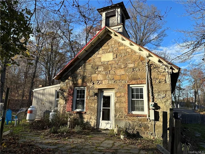 A Rare OPPORTUNITY to own Hultgren&rsquo;s Round Hill School House. This unique, historical STONE HOME which was originally a school was built, handcrafted with love in 1880. The exterior was done with local rocks, giving it a very strong foundation with a rustic wooden interior and handmade doors & closets done by a Master Craftsman. Solid, pressure treated truss beams anchor the second floor. If you&rsquo;re looking for a worthwhile project to restore this home to the glory of yesteryear, then this property with endless potential and possibilities is your new project. HOME BEING SOLD AS IS