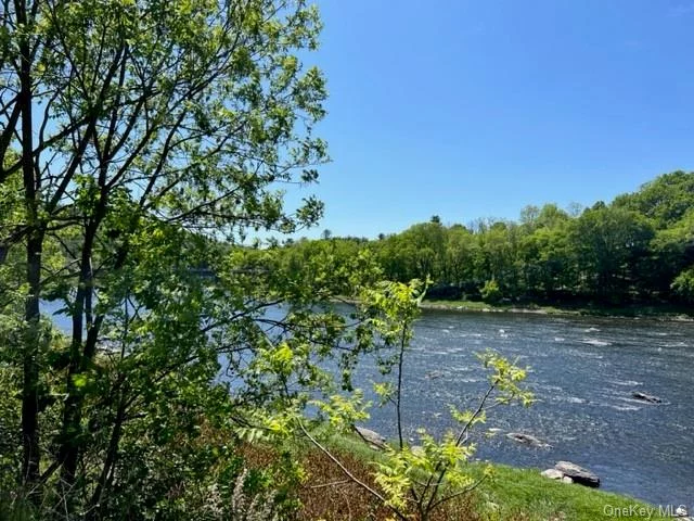 Riverfront!!!! Hard to find property, located in the charming hamlet of Barryville. 322&rsquo; of Delaware River Frontage that offers so much potential. Fabulous location w/ frontage on two roads, Route 97 & River Road! Spectacular Views of the river & the Barryville-Shohola Bridge. Walk to conveniences, farmers market & to your own Delaware River frontage for recreation & total relaxation! Sold together w/ second lot 3409 Route 97 w/ Vintage home that is ready to be totally rehabilitated & brought back to it&rsquo;s original 1910 charm! Total of over 1 Acre. Home needs complete restoration from roof to basement but retains it&rsquo;s original charm & character w/wood floors, original kitchen cabinets & wainscoting. A great opportunity for a true old house lover that&rsquo;s not afraid to roll up their sleeves & hire a contractor to make repairs. Being sold in it&rsquo;s current condition; this property has Commercial/Residential uses so let your imagination soar!!!