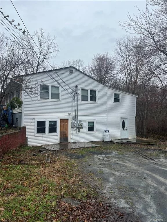 3 BEDROOM apartment with HEAT AND HOT WATER INCLUDED. Wallkill schools! Ground floor apartment available immediately. 3 bedrooms, 1 bathroom, over 800 sq ft. Good size living room, open kitchen, dining room. Close to shopping, parks, and school, yet set back off the beaten path. Driveway parking.