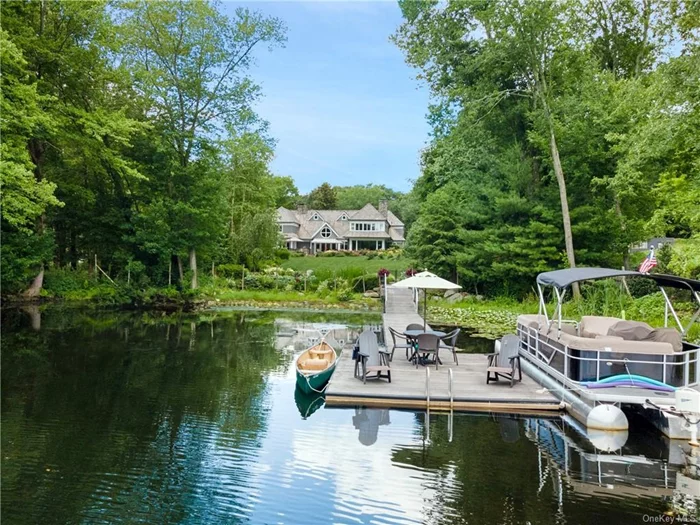 Spectacular Nantucket style waterfront directly on Blue Heron Lake with breathtaking views. This country home is gated, fenced and completely private with truly beautiful land, gardens and fabulous dock, pool and pool house. Blue Heron is a private, 45 acre spring fed lake with crystal clear water for swimming, boating, fishing and ice skating in winter. There are only 13 private homes on the lake and no public access. The open front-to-back entry with water views leads to spacious great rooms made for both entertaining and everyday family living. The lovely chef&rsquo;s kitchen and top-of-the-line baths make the house a joy to be in. This is the perfect location under one hour from NYC, moments to the charming town of Scotts Corners for dining and shopping, amazing cultural institutions and year round recreation with the Henry Morgenthau Preserve on the north end of lake for hiking and cross country skiing. Brand new cedar shingle roof!