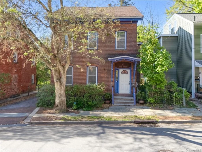 CALLING ALL INVESTORS AND OWNER OCCUPIERS! Amazing opportunity to own a brick 2-family home in the heart of Historic Downtown Poughkeepsie, Union St! VACANT & ready for its nexts owner, able to live in one, rent the other or rent both! Potential gross income of $50K, 10%+ CAP and price to sell! Tasteful updates throughout preserving the period charm featuring updated kitchens and baths and freshly painted throughout. Both units are spacious and have 2 bedrooms and 1 bath, while the upstairs larger unit features more finished SQ FT and a walk-up attic for future expansion and storage. With 2 separate gas and electric meters, expensing the utilities onto the tenants is possible! Full unfinished walk-out basement with great storage for the tenants and landlord. Exterior features a large lot with a level yard for outdoor entertainment and a newly rebuilt 1 car detached garage, perfect for more storage! Municipal water, sewer and natural gas! Excellent location, a stone&rsquo;s throw to the Mid Hudson Bridge, Hudson River Waterfront and Poughkeepsie Train Station, minutes to the Walkway Over the Hudson,  Culinary Institute and Marist Colleges, amazing proximity to lower main food & drink, shops, schools and more!