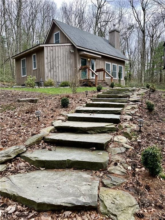 Super special 940+ sq ft home on an incredibly private and luxurious 5+ acres. Built in 2015 by Catskill Farms, the original purchaser has maintained the home exquisitely and done a ton of exterior landscaping and hardscaping work to make this place an oasis of tranquility. Tons of glass for easy viewing of the mountain laurel and wooded land, several outdoor entertaining areas including decks, firepits and stone patios. The interior has a wood -burning stove that could be used to easily heat the house. One bedroom downstairs with an adjacent bath and a large open 2nd floor loft serves multiple purposes, be it sleeping, media or hobby. Just minutes from Narrowsburg on one the best Upstate streets around.