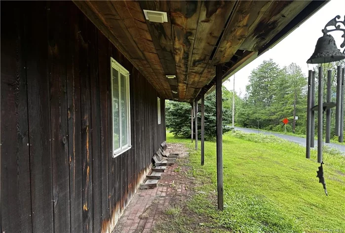 What a charmer - bring your ideas and hammer to this wonderful lodge type home, located within minutes from Hunter Ski Mountain and minutes from popular downtown Tannersville. This contemporary home features large rooms, vaulted ceilings, large yard and quaint community. This is a fixer upper, priced accordingly.