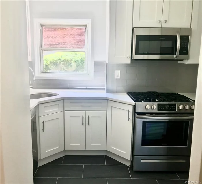 Fully available 4/26. Continue to show. Gorgeous recently renovated high end custom designed kitchen in this conveniently located two bedroom apartment, for rent only, in well maintained Tappan Manor Condominium in Tarrytown. No Pet, No Smoking permitted anywhere on premises. Laundry in basement, one unassigned outdoor parking space per rental unit. Completed rental application and credit/criminal check required for all prospective tenants using the NTN application ($20). Prospective tenant completes directly online. Separate application required for each person applying. No one year lease. Minimum two year lease. Tenant will be responsible for $1500 condo rental fees, including move in/move out, carpet check and car stickers and condo application. Call Showing Time for appointments. Great Metro North train commute -38 minute Express Train to Grand Central NYC from Tarrytown.