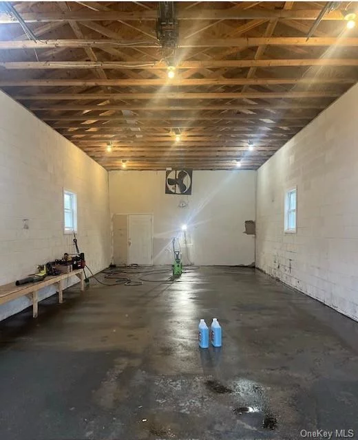 **Prime Commercial Space in Lagrangeville, NY! Ideal for Storage or Carpentry Workspace!** Looking for the perfect spot for your storage needs or carpentry projects? Look no further! This 1000 square feet commercial space is conveniently located minutes away from major routes. Featuring a spacious 50x20 layout, this versatile space is tailor-made for your storage requirements or carpentry workshops. With a 12-foot garage door, maneuvering large equipment and materials is a breeze, making it an ideal choice for woodworking enthusiasts and professionals alike. Ideal for a small business owner looking to expand or a craftsman seeking the perfect workspace. Don&rsquo;t miss out on this incredible opportunity! No bathroom. No water access or heat. Only electric. Space as-is. Contact us today to schedule a viewing.
