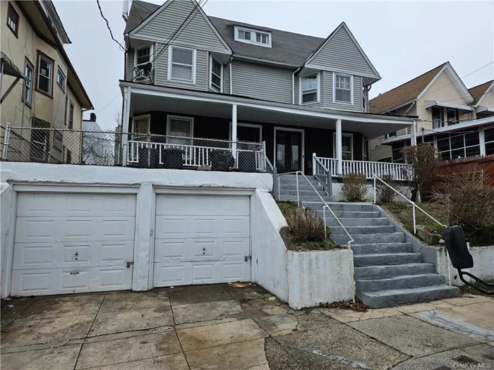 LARGE LEGAL 3 Family, *** NEEDS UPDATING / TLC / WORK *** , home is livable with no leaks and great heat.The LEFT Side of house is a Triplex w/ 5 BR&rsquo;s and 1.5 baths and its own basement / garage. The right side of the house is a 1 BR flat on the 1st flr & a 3BR duplex(2nd &3rd flr) with a full bath, it own basement and garage, So Basically? This is a Huge 5 BR House thats attached to its own mirror image income producing twin thats broken up into 2 additional units 1BR & 3BR . PLEASE NOTE: Viewings will open ALL 3 Kitchens , 3 Full + 2 (1/2) baths + Both Basements and BOTH garages + &rsquo;most&rsquo; of the BR&rsquo;s will be seen in ONE visit.