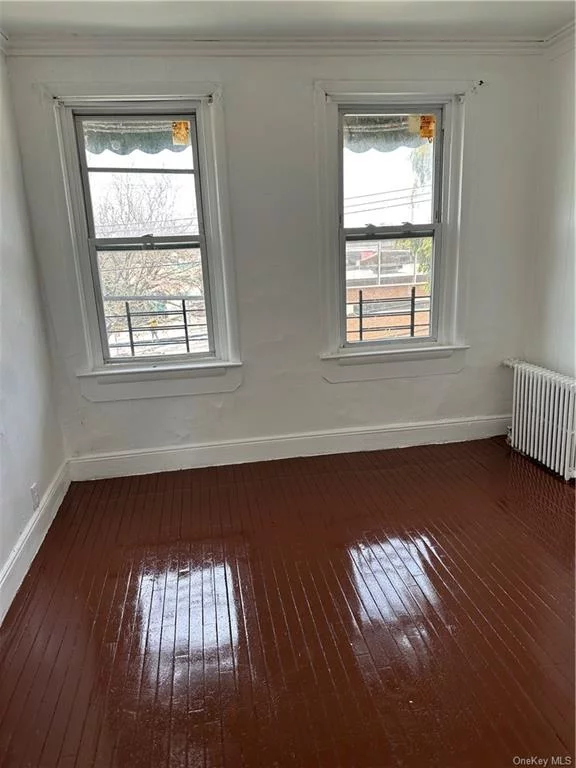 welcome to this beautiful newly renovated apartment, it boasts of 2 large Brms, living Rm, formal dinning Rm on the second flr. apartment is located in a quite Neighborhood in NE Bronx