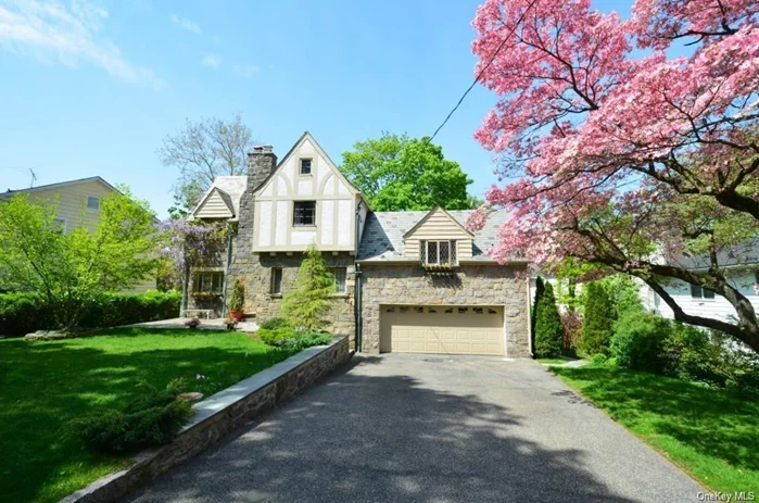A must see, charming, immaculate 3/4BR/4.1 Bath Stone Front Tudor. Among the many wonderful features: Sunken LR w/stone fireplace. State of the Art Dine-In Kitchen w/ open floor plan opens to Slate Terrace. Large Family Room w/ Glass Wall opens to Terrace. Large Multi-use Room w/ Private Slate Terrace. MBR Ste. w/Bath. Newly renovated Lower Level w/ 10 Ft. Ceilings. Fenced Yard. Central Air. Desirable Bronxville Field  Club Area.