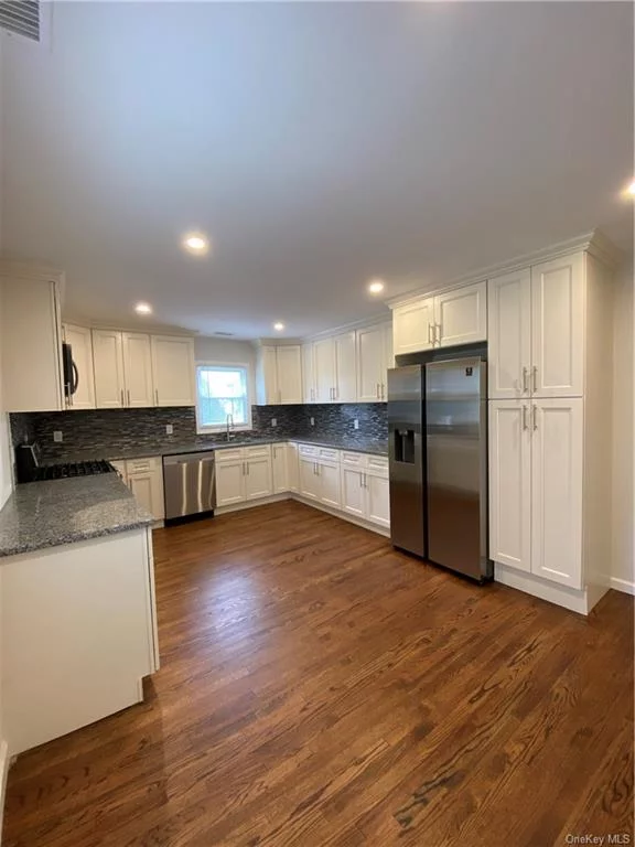 Location, Location, Location- completely renovated 3 bedroom home located in the heart of Harrison. This sun-filled home offers 3 Bedrooms, 1 bath, beautiful large eat-in-kitchen, laundry in unit, separate entrance. Close to town, restaurants, schools, shops and Metro-North train.
