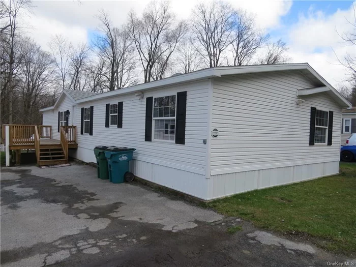 This 2001 Mobile Home has been totally remodeled. New Windows Thru Out, New Flooring Engr. wood thru out, New counter tops in the Kitchen, cabinets in kitchen beautifully repainted New stove, New refrigerator, Option to pick either Refrig. New Dish Washer, Home repainted thru out...ceiling and walls. New washer and dryer. Mbath totally remodeled, Double Sink, New Vanity, New Mirror and lighting, New walk-In shower and toilet, New closet for your linens. New 10 X20 ft. Deck. 2nd BathRm completely remodeled. HOA also Includes Taxes. Newer Roof 2021. Compressor not working Air Conditioner.
