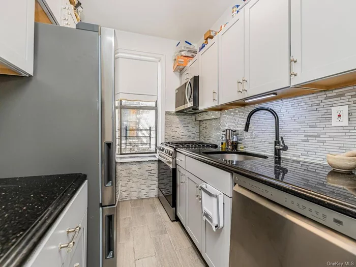 Welcome to this modern Two-Bedroom Coop, located in the heart of The Bronx. This spacious two-bedroom coop features a large living room, with a renovated kitchen and bathroom, well up keep home. Enjoy a quick walk to The Botanical Garden and The Bronx Zoo. The open-concept kitchen is perfect for entertaining, and the large windows flood the space with natural light. Conveniently located near shopping areas, public transportation.