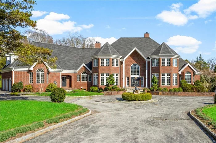 Set on a sprawling 3.5 acre in an exclusive historic estate neighborhood of Briarcliff Manor, an award-winning school district, this home is not just a residence but a promise of a life well-lived. Embrace the opportunity to own a rare red brick grand colonial mansion, a piece of luxury, where every detail is a stroke of genius and every moment is an experience in grandeur. Step through the stately entrance and be greeted by an ambiance that exudes a European flair, with exquisite details that capture the essence of refined living, this home is designed for both grand entertaining and intimate enjoyment.The foyer sets the tone for a home that is both majestic and warmly inviting, leading to entertaining spaces in the formal living room and formal dining room, which are adorned with fine finishes and artisanal touches, offering a canvas for social gatherings or tranquil relaxation.The heart of the home is a gourmet kitchen, a culinary haven with top-of-the-line appliances and bespoke cabinetry, seamlessly transitioning to the family dining area adjacent to a bright and expansive family room. Retreat to the sumptuous primary suite, a sanctuary of luxury with a spa-like bath, dressing room, private deck, expansive views of the verdant grounds, and an adjacent oval room home office. The second floor presents an additional 5 bedrooms, 5 bathrooms, another home office and a second floor activity room,  accommodates family and guests with equal opulence. The home&rsquo;s grandeur extends to the additional 2500 square foot lower level. A versatile expanse designed for a multitude of indoor activities: a putting green, an archery range, a gym, a sauna, a massive recreation room, an entertainment lounge that walks out to the yard, a grand wine cellar and its wine tasting room - this space is ready to cater to your lifestyle needs. Outside, the property&rsquo;s rolling yard is a testament to the home&rsquo;s seamless integration with its natural surroundings. The fully fenced oasis has the potential to construct a generous sized swimming pool and a pool house. Or, simply indulge in the private splendor of landscaped gardens, or host lavish outdoor soirees that leaves guests in awe.