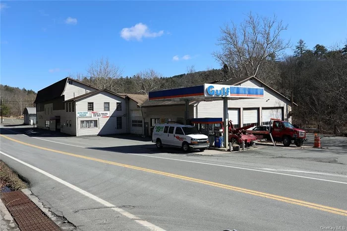 Automotive garage & former gas station known as Roche&rsquo;s Garage in Callicoon. Consisting of 4 buildings, 2 gas pumps & large parking area. All set on 5 acres with 1400&rsquo; on Callicoon Creek frontage. Main building is 20, 000+/- SF consisting of 3 furnaces, 3 phase electric, 5 lifts, 1-20, 000 gallon fuel tank, 1-10, 000 gallon fuel tank. 16&rsquo; high ceilings-many large overhead doors, 2 large garage service areas, body shop with spray booth, lobby entrance, plus many office rooms on 1st & 2nd floor. Storage areas for 1000&rsquo;s of automotive parts from basement to attic. Building 2 is the tire storage shed (108x45), Building 3 is the vehicle storage garage (45x102), Building 4 is 24x45 and is used for storage. Great level location, 1400 ft on NYS Route 17B and intersection of NYS Route 97, a high traffic location. Let your imagination be your guide, from automotive and industrial to retail sales. This is the gateway to Pennsylvania and the bustling Hamlet of Callicoon on the Delaware River.