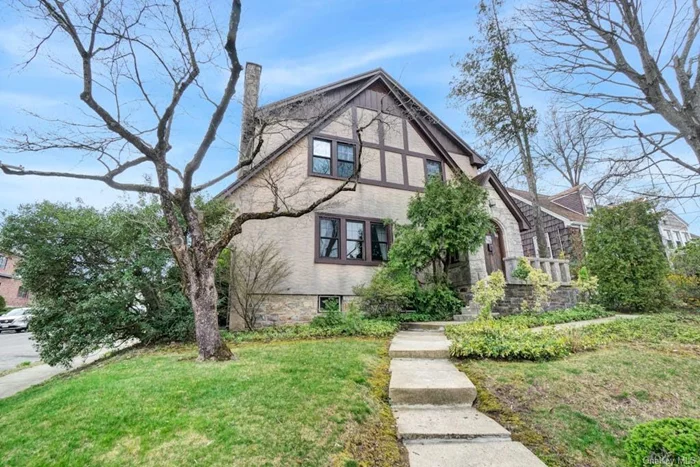 Bryn Mawr Colonial/Tudor in great condition awaiting your touch!!!!  Almost 2, 000 square feet of living space on a lovely corner lot in quiet, sought after neighborhood!!!!  LR/fireplace, FDR, Kitchen w/separate Breakfast Nook, Den/Office, Powder Room up to Large Primary w/access to hall bath w/shower and tub, second and third good sized bedrooms, 1 car attached garage. Must see. Will not last at this price of $ 659, 000!!!!