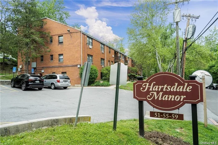 Step into this inviting and expansive unit within the coveted, PET FRIENDLY Hartsdale Manor! This spacious unit offers a private patio, 2 unassigned private parking spaces, a nicely renovated kitchen and bathroom, and hardwood floors throughout. This property has laundry facilities on-site as well as a community POOL! Situated mere minutes from Central Ave shopping, major highways, and the Metro-North Railroad, this residence offers convenience, leisure,  and so much more!