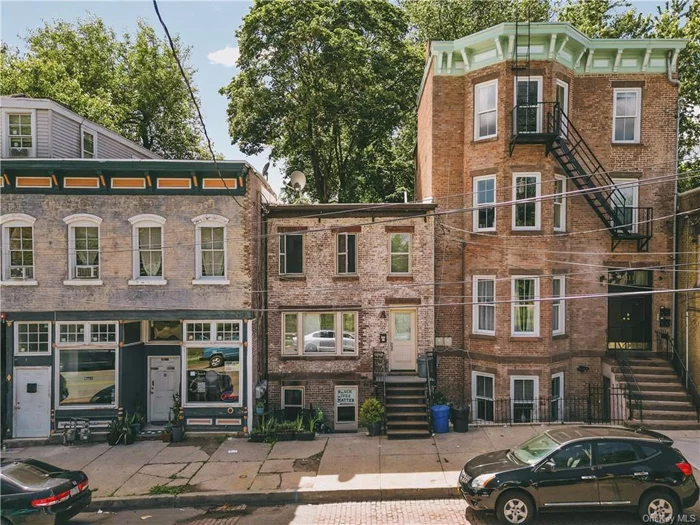 Entirely restored turnkey duplex in the heart of the City of Newburgh on central Liberty Street. Brought back from a shell building in 2016 to be in keeping with the historical character of the neighborhood while also integrating modern and energy efficient finishes on the interiors. There are two units, a 1bd/1ba garden apartment downstairs and a 2bd/1.5ba unit upstairs. Both apartments are rented to long term tenants in good standing with month to month leases that are below market. Hardwood floors throughout, the kitchens feature stainless steel appliances, including dishwashers, and fully electric utilities covering the hot water tanks and mini-split heat pump systems that efficiently heat and cool each unit alongside insulated modern windows. The central walkable location is blocks to the Hudson waterfront and MetroNorth ferry slip, the public library, and Horizons on the Hudson Elementary School.