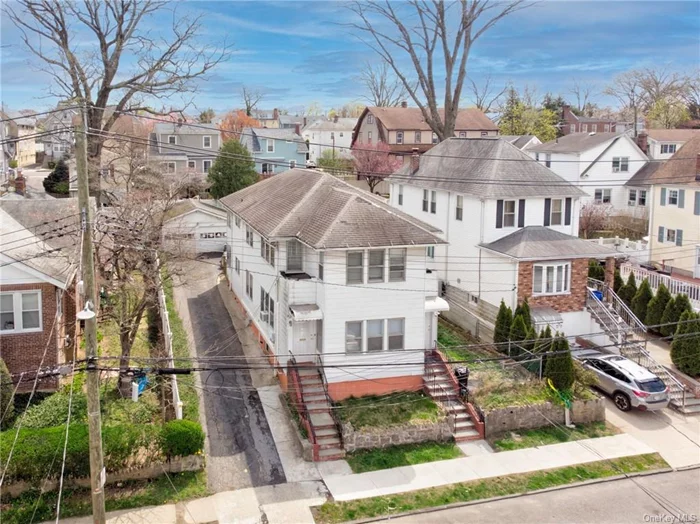 Welcome to 10 Cypress Street, a charming two-family home in the desirable Lincoln Park area of Yonkers! This property features 6 bedrooms and 2 bathrooms, making it perfect for families or investors. Live in one unit and rent out the other to help cover your mortgage.  The right unit has been beautifully renovated with modern finishes, while the left unit offers the opportunity for customization. Enjoy a spacious and flat backyard ideal for gatherings and relaxation, as well as a large driveway and detached 2-car garage for ample parking.  With a walk-out basement, new AC, and heating systems, this home is equipped for comfort and convenience. Located on a peaceful street with low taxes, this property presents a unique opportunity to own a versatile and valuable asset in a vibrant neighborhood. Don&rsquo;t miss out schedule your showing today to explore the possibilities of this incredible home!