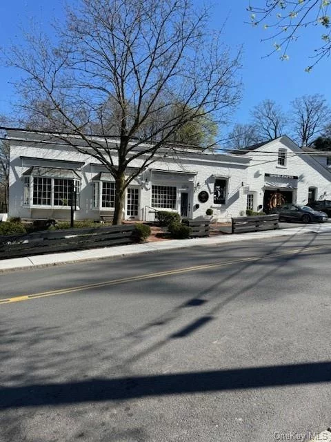 Great office in town, close to train and shops, first floor office/retail space with town water and sewer. Currently set up with three private offices, conference room, file room, sitting area, and large open front office. Light, bright with high ceilings.